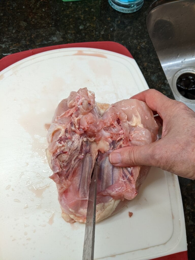 01 pierce bone center of chicken breasts