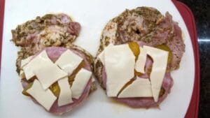 2nd layer of swiss chees and ham added to grilled cuban stuffed pork chops recipe