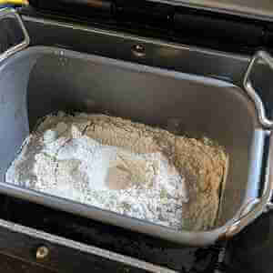 All ingredients added to bread machine for yeast rolls