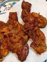 Bacon-cooked-several-slices-view-2-150x200-1-1