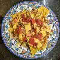 Building-chicken-Nachos-add-tomatoes-and-salsa-200x200-1-1