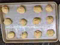Roll each piece into a ball onto baking sheet