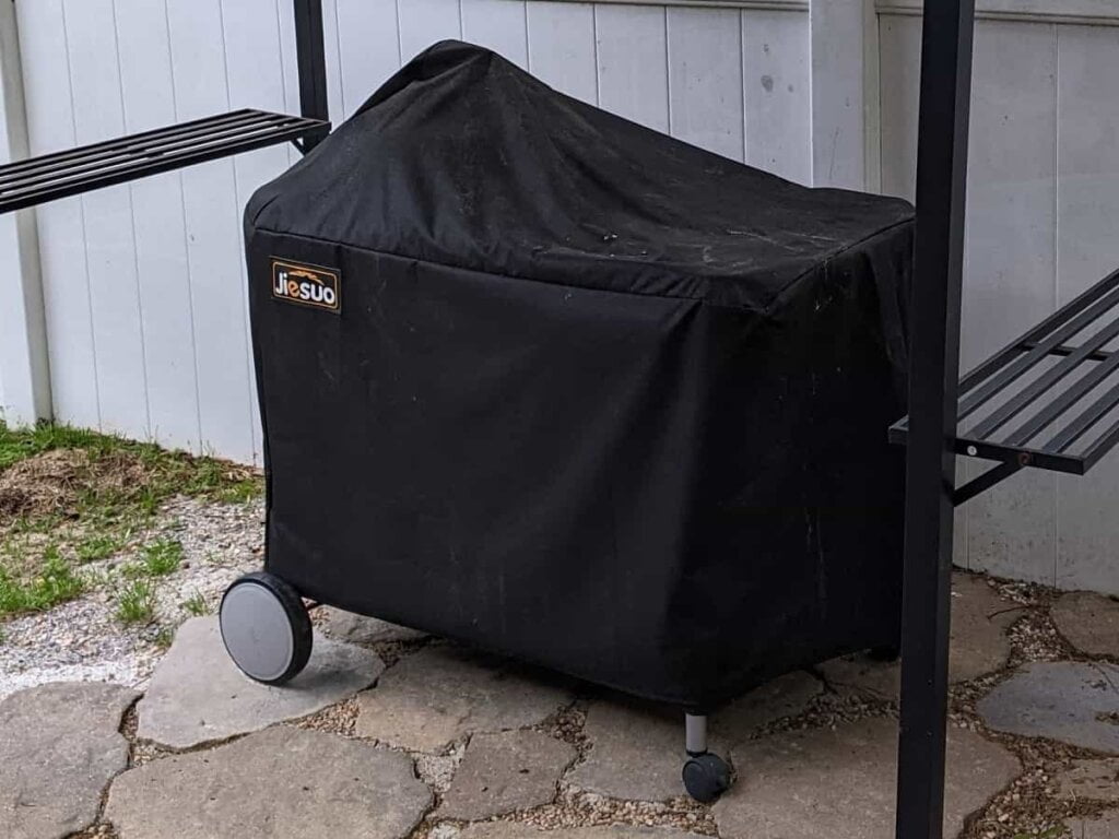 a good grill cover helps keep out moisture for hotter charcoal