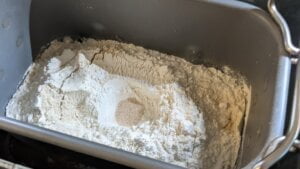 add all pizza dough ingredients to bread machine