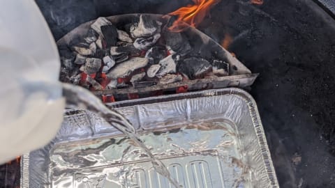 add water to drip pan for rotisserie use
