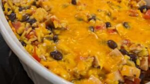 added cheese topping to saffron rice and chicken casserole recipe
