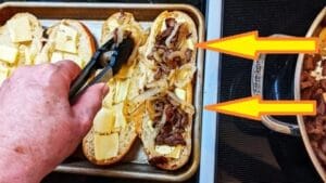 adding cooked steak and onions to open face bread halves for steak cheese sandwiches recipe
