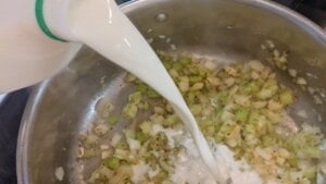 Adding initial milk to cream of celery soup