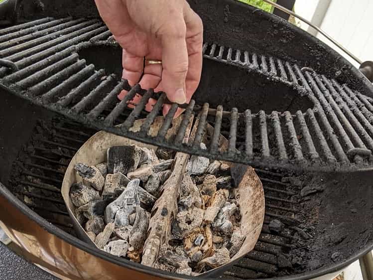 aligning 2 charcoal trays to light for indirect heat