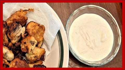 appetizers with pizza like fried mushrooms and dip