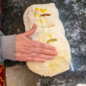 applying olive oil to calzone dough top applying olive oil to calzone dough top