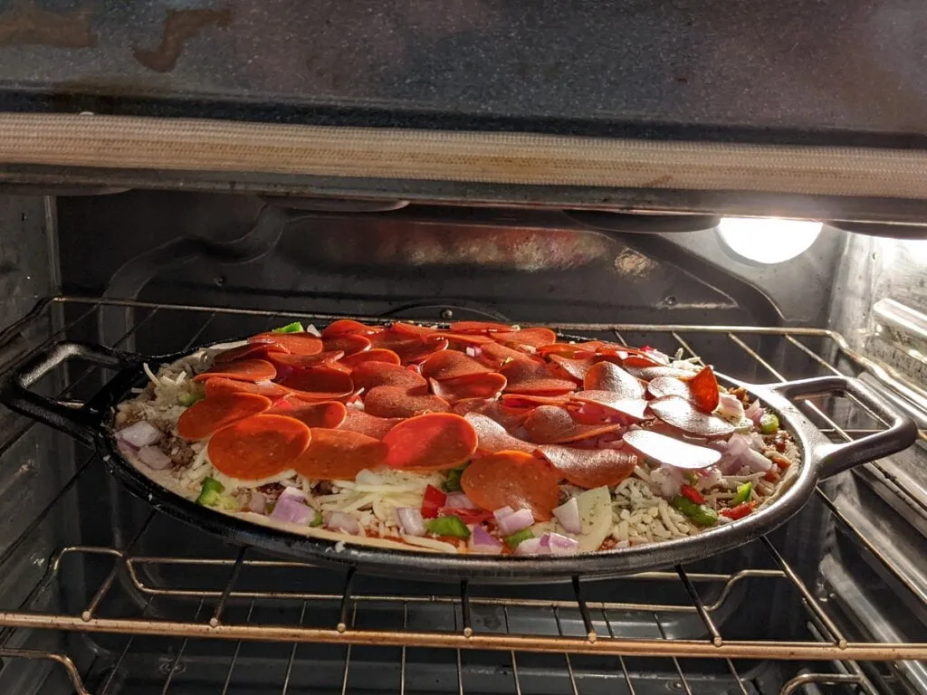 Baking pizza on pizza cast iron pan