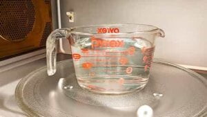 boiling water in microwave for start of how to make southern sweet tea recipe