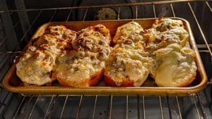 broiling cheese covered open face steak sandwiches in oven