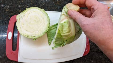 cabbage core head on top then cut away each half
