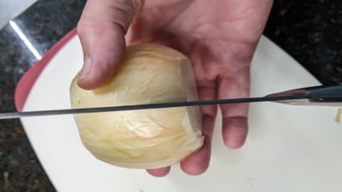 carve a shallow slit across half the onion carve a shallow slit across half the onion