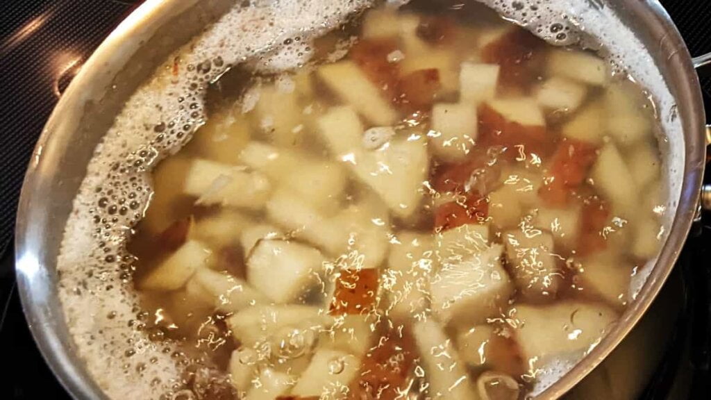 cooking potato pieces in water for potatoes with green beans recipe