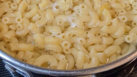 Cooking the macaroni cooking the macaroni