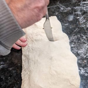 cutting air pocket slits in a calzone cutting air pocket slits in a calzone