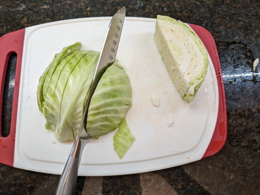 Cutting half of cabbage for a recipe