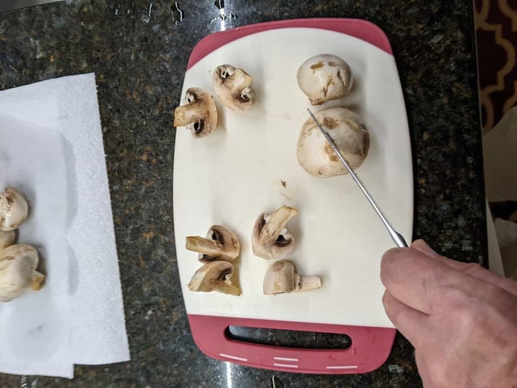 cutting mushrooms for how to make homemade fried mushrooms prep