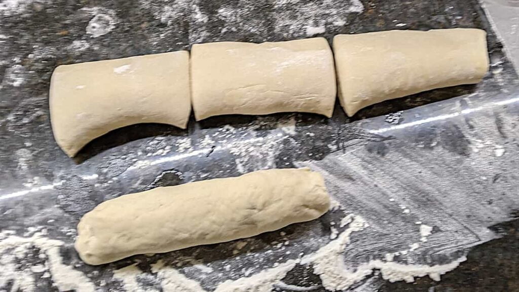 dividing dough into 4 pieces for bread machine sub rolls