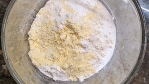 Dry ingredients in mixing bowl for cornbread muffins