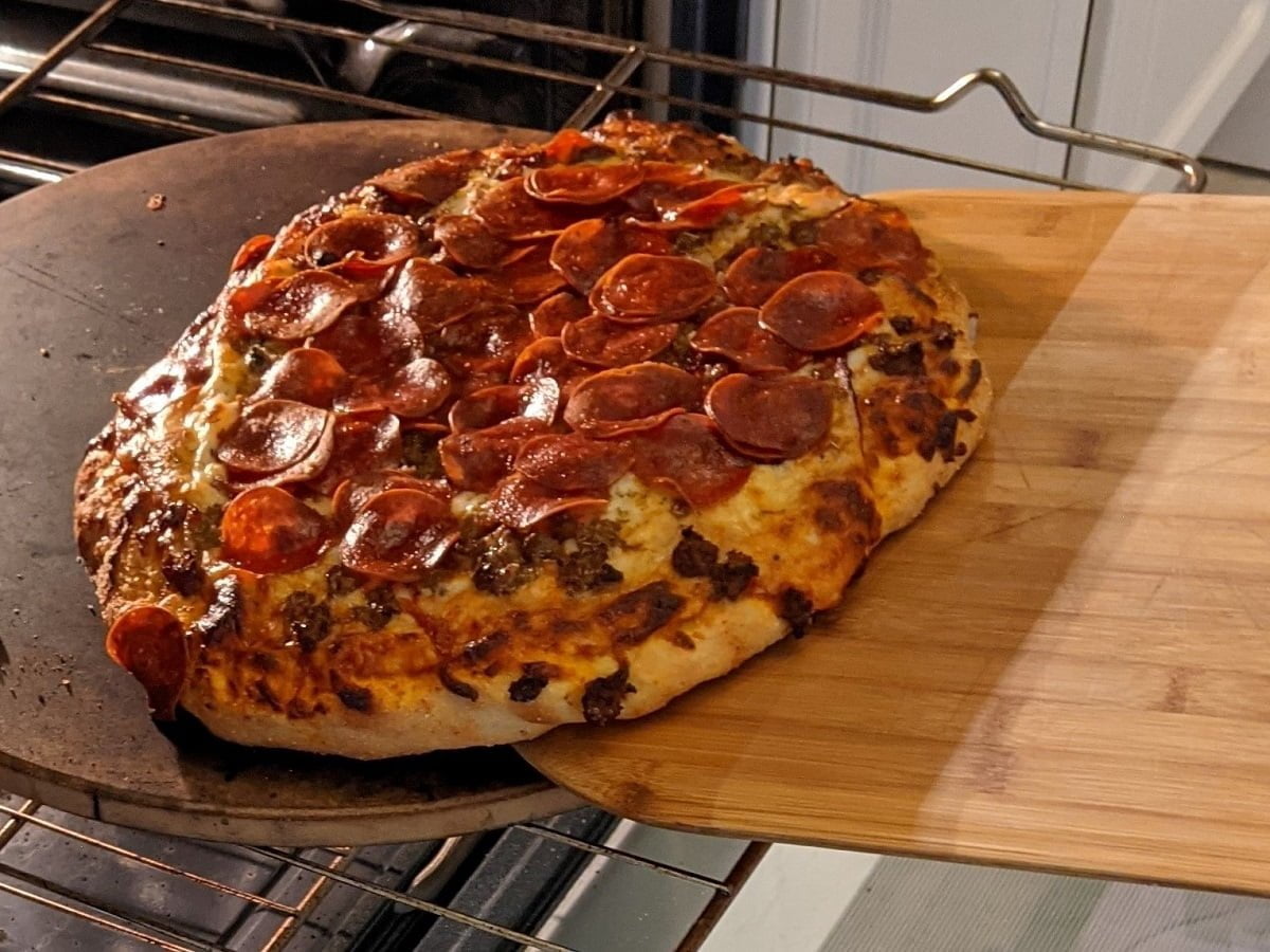 Finished homemade sausage and pepperoni pizza from oven