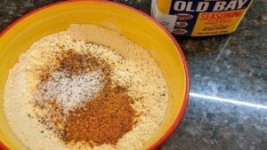 fried fish flour cornmeal and seasonings in bowl