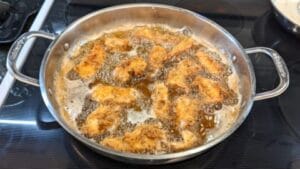 frying seasoned boneless chicken breast tenders