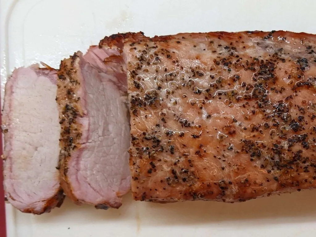 getting ready to store grilled pork tenderloin for leftovers