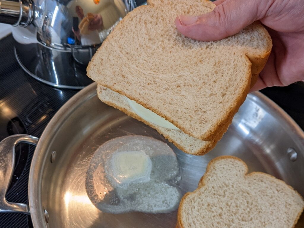 Grilled cheese in pan a little below medium heat