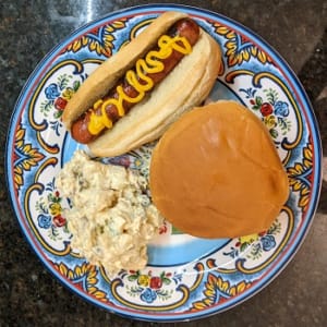 grilled hot dog and burger dinner plate grilled hot dog and burger dinner plate