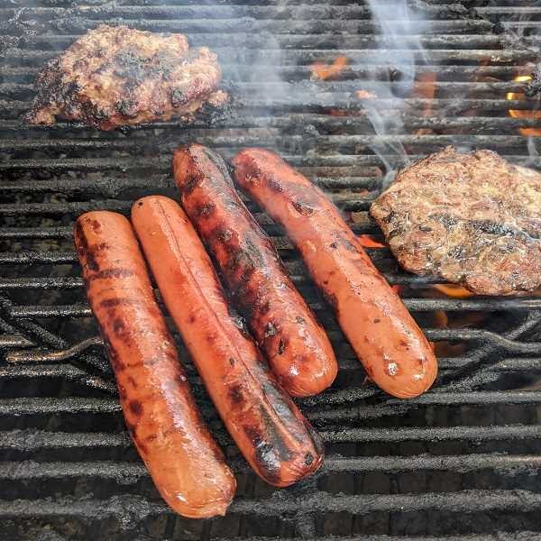 Grilling hamburgers and hot dogs together