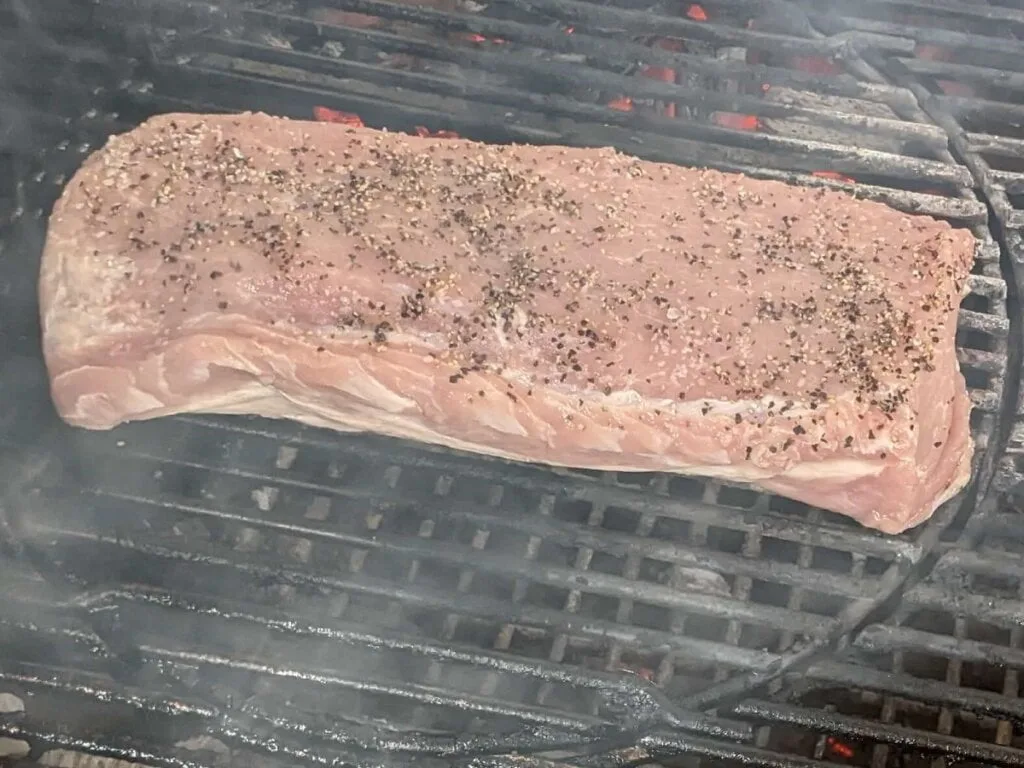 grilling pork tenderloin fat side down on charcoal grill