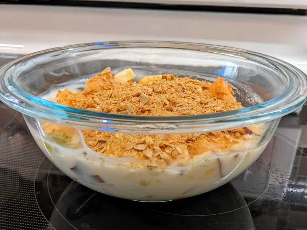 Group bowl of strawberry yogurt granola parfait