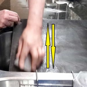 how to clean a pizza steel deep using a cleaning block