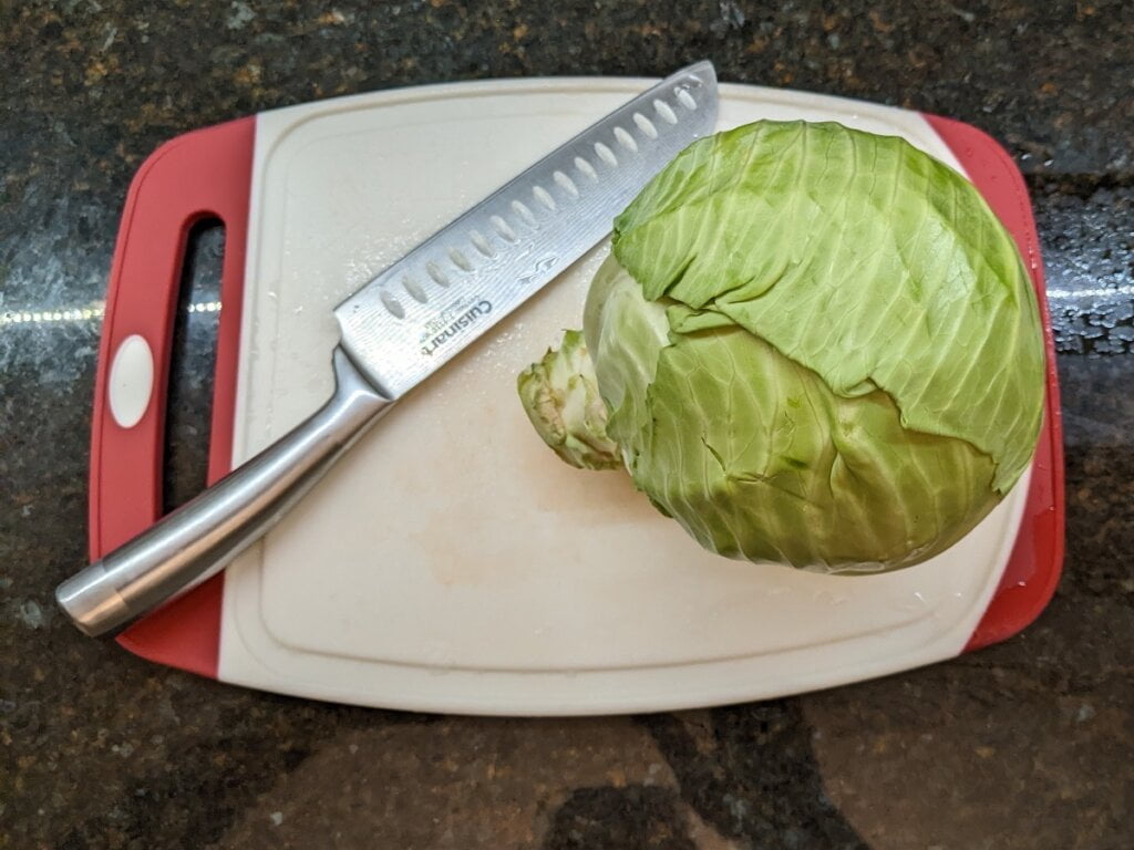 How to cut a cabbage on a cutting board