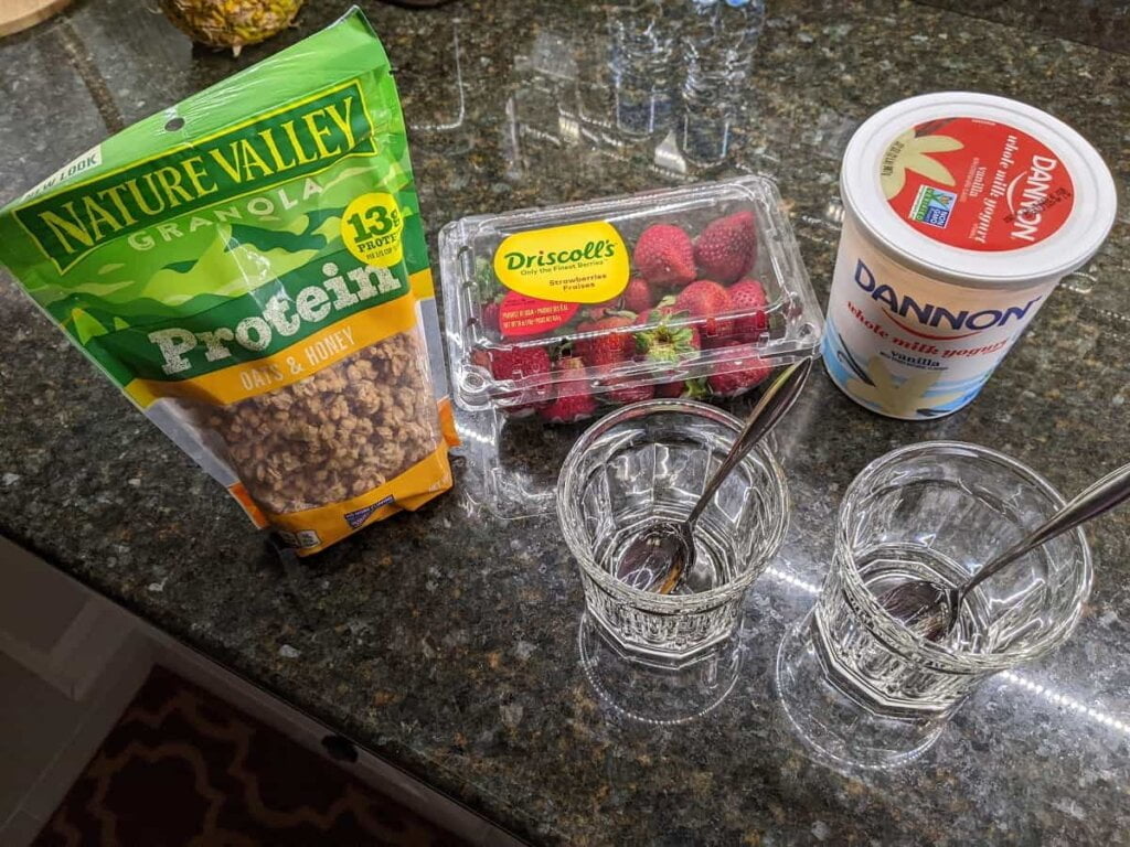 Ingredients for strawberry yogurt granola parfait