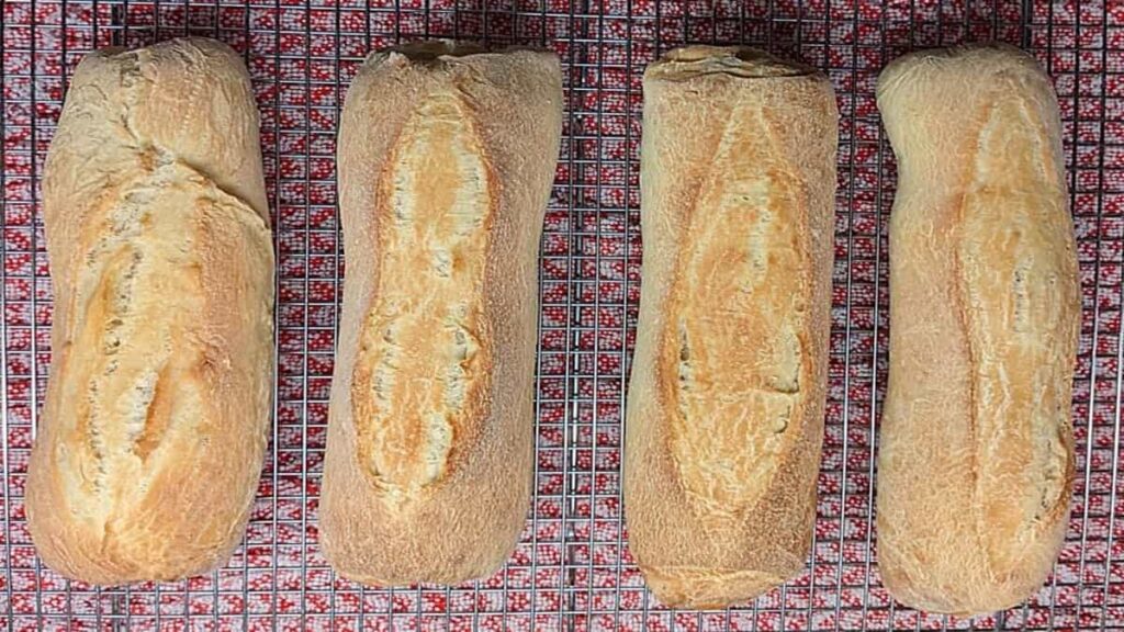 letting baked bread machine sub rolls cool in wire rack