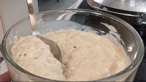 lifting out a scoop of old fashioned flapjacks batter