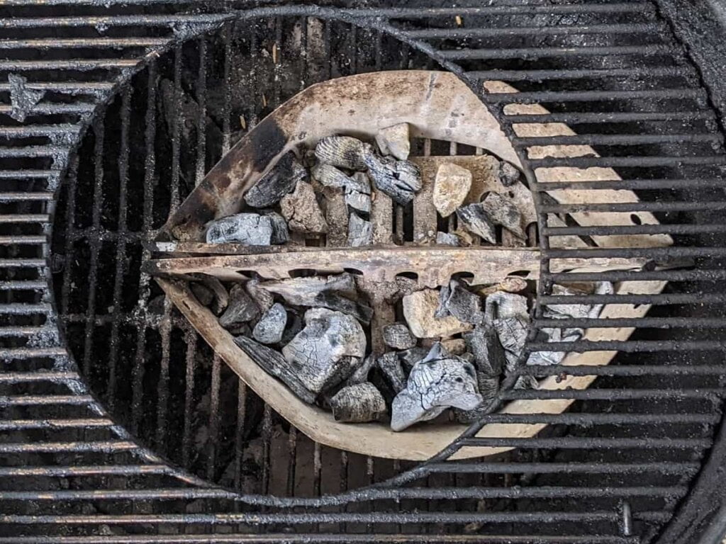 lined up 2 charcoal baskets ready to fill up in weber grill