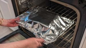 make foil tent over all burger sliders on steamer tray