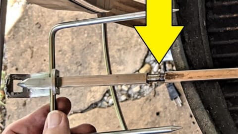 notch on pointed end of rotisserie spit