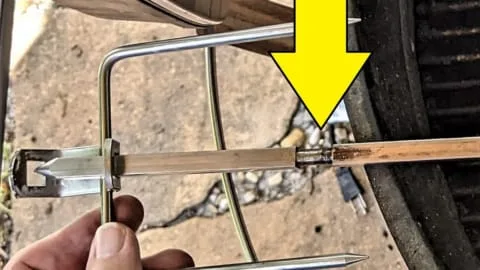 notch on pointed end of rotisserie spit