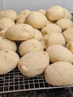 par-baked yeast rolls on cooling rack