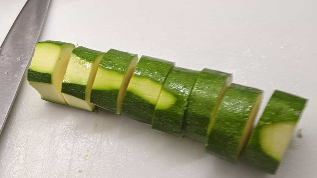 difference between zucchini and yellow squash showing sliced zucchini