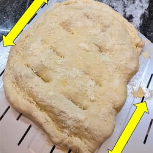 perform a final pizza peel test shake before transferring calzone to oven