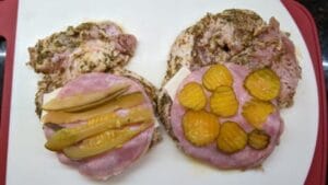 pickle layer added to pan fried cuban stuffed pork chops recipe