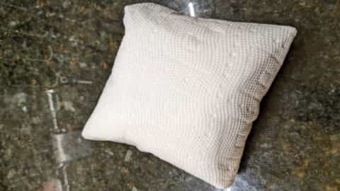place in microwave with folds tucked underneath